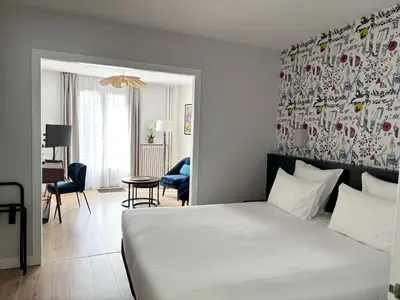 Un ou plusieurs lits dans un hébergement de l'établissement Gabriel Hotel Chinon