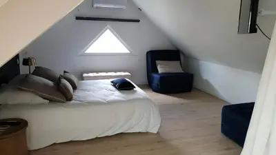 Un ou plusieurs lits dans un hébergement de l'établissement Chambres d hotes Couette et Campagne