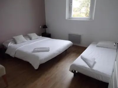 Un ou plusieurs lits dans un hébergement de l'établissement Domaine de Bel Air