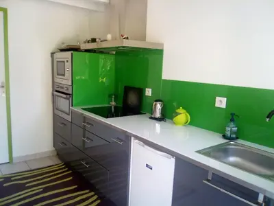 Cuisine ou kitchenette dans l'établissement 21 Les Boissières