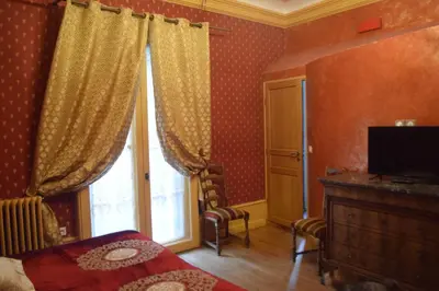 Télévision ou salle de divertissement dans l'établissement Lit en Loire