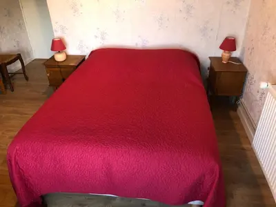 Un ou plusieurs lits dans un hébergement de l'établissement Chambres d'hôtes Domaine De La Jonquière, Bouloire
