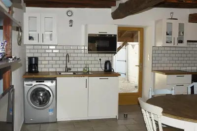 Cuisine ou kitchenette dans l'établissement Gîtes Angulus Ridet