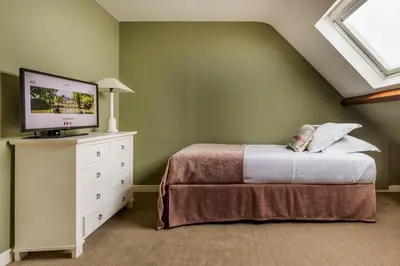 Un ou plusieurs lits dans un hébergement de l'établissement Les Hauts de Loire Relais & Châteaux