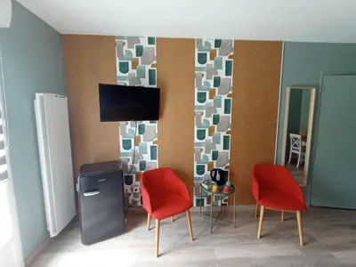Télévision ou salle de divertissement dans l'établissement Chambres d'hotes 