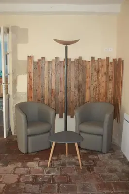 Coin salon dans l'établissement Le Domaine de Bella