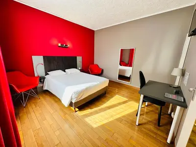 Un ou plusieurs lits dans un hébergement de l'établissement Hotel Italia