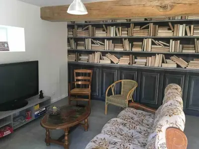 Télévision ou salle de divertissement dans l'établissement LE GRAND PARADIS