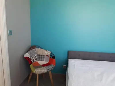 Un ou plusieurs lits dans un hébergement de l'établissement Petite suite sympa Avoine