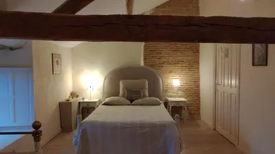 Un ou plusieurs lits dans un hébergement de l'établissement Le Manoir de Gâtines