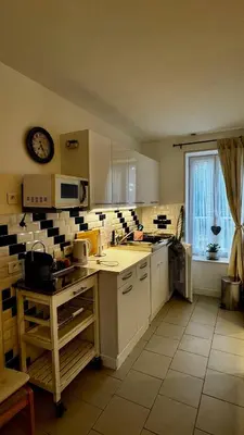 Cuisine ou kitchenette dans l'établissement Le Cormier