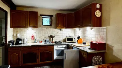 Cuisine ou kitchenette dans l'établissement Le Cormier
