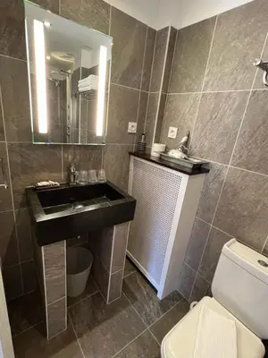 Salle de bains dans l'établissement Chambres d'hôtes & Spa Les Perce Neige