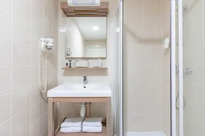 Salle de bains dans l'établissement Appart'City Confort Le Mans Centre