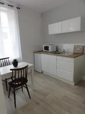 Cuisine ou kitchenette dans l'établissement L'Eau Reine