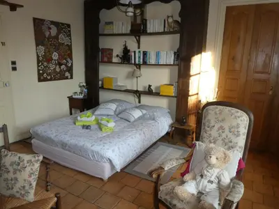 Un ou plusieurs lits dans un hébergement de l'établissement Le Chat Courant