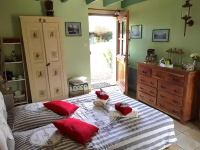 Un ou plusieurs lits dans un hébergement de l'établissement Le Chat Courant