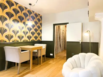Coin salon dans l'établissement Appartement de charme au cœur du centre historique