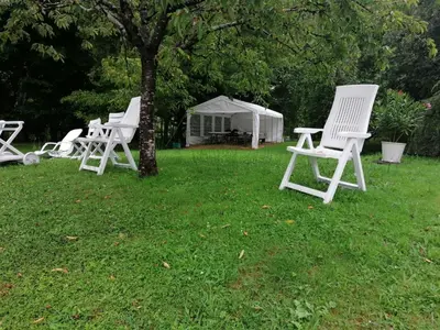 Jardin de l'établissement CHAMBRE INDEPENDANTE DANS UN PARC