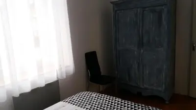 Un ou plusieurs lits dans un hébergement de l'établissement Appartement Taïko