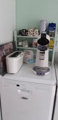Cuisine ou kitchenette dans l'établissement La maison de Mathilde
