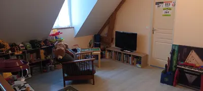 Télévision ou salle de divertissement dans l'établissement La maison de Mathilde