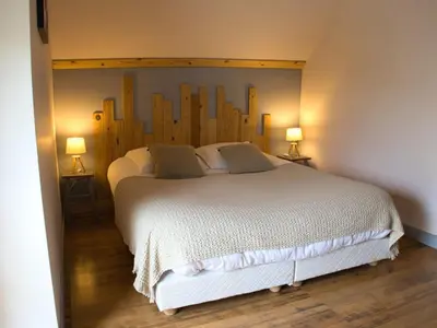 Un ou plusieurs lits dans un hébergement de l'établissement Cottage l'Orée du Cher