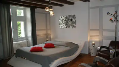 Un ou plusieurs lits dans un hébergement de l'établissement Chateau de Vaugrignon - Beer Spa