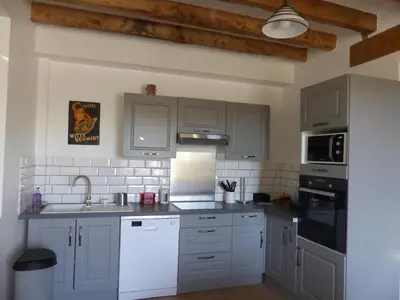 Cuisine ou kitchenette dans l'établissement La maison de Joëlle