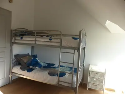 Un ou plusieurs lits dans un hébergement de l'établissement La maison de Joëlle