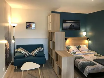 Un ou plusieurs lits dans un hébergement de l'établissement Studio cozy hypercentre