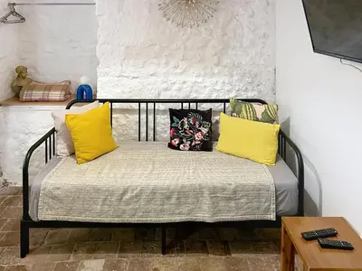 Un ou plusieurs lits dans un hébergement de l'établissement Appartement spacieux avec une vue sur Tours ( 38m²) -Gite de Bellevue
