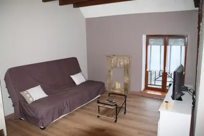 Coin salon dans l'établissement appartement Le Rive Gauche