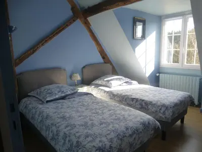 Un ou plusieurs lits dans un hébergement de l'établissement La Maison du Closier