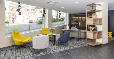 Coin salon dans l'établissement Appart'hôtel Odalys City - Le Mans Centre Palais des Congrès