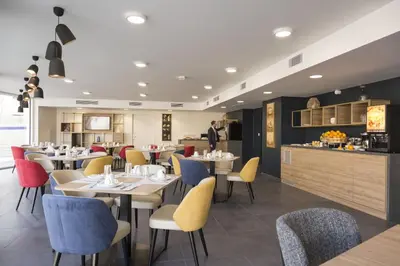 Coin salon dans l'établissement Appart'hôtel Odalys City - Le Mans Centre Palais des Congrès