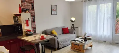 Coin salon dans l'établissement Loc126