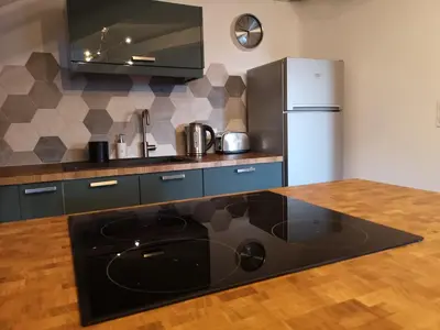 Cuisine ou kitchenette dans l'établissement Happy Cocoon - Immersion au centre historique
