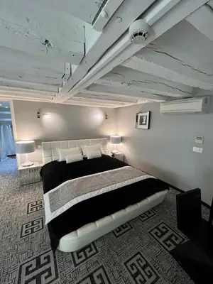 Un ou plusieurs lits dans un hébergement de l'établissement Art Hotel
