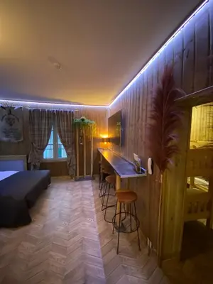 Un ou plusieurs lits dans un hébergement de l'établissement Hôtel Relais du Loir