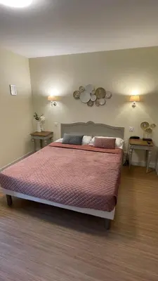 Un ou plusieurs lits dans un hébergement de l'établissement Hôtel Relais du Loir