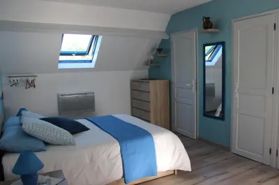 Un ou plusieurs lits dans un hébergement de l'établissement Chambres d'hôtes de la Forge