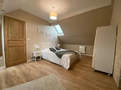 Un ou plusieurs lits dans un hébergement de l'établissement La vieille maison