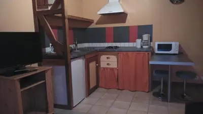 Cuisine ou kitchenette dans l'établissement suite familiale 2 chambre