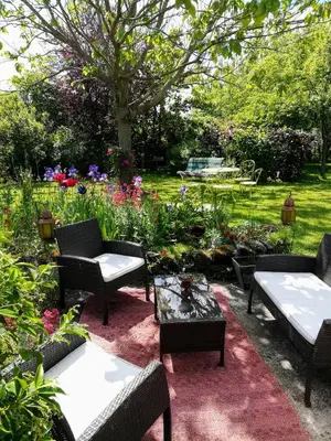 Jardin de l'établissement Chambre chez l'habitant