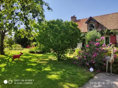 Jardin de l'établissement Chambre chez l'habitant