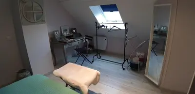 Télévision ou salle de divertissement dans l'établissement chambre chez l'habitant