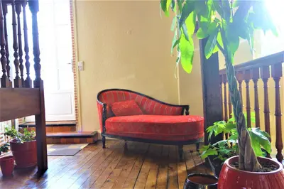 Coin salon dans l'établissement LA MAISON DE ROSE