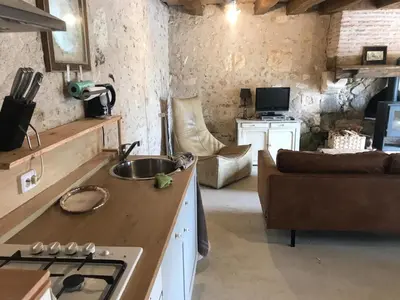 Cuisine ou kitchenette dans l'établissement Côte du Jardin