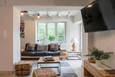 Télévision ou salle de divertissement dans l'établissement Country House - La Charbonnière